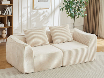 Minimalist Sofa With Curved Lines And Horn Shaped Throw Pillows