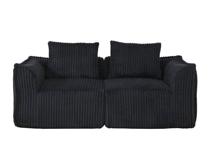 Minimalist Sofa With Curved Lines And Horn Shaped Throw Pillows