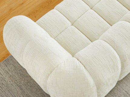 Quilted Cloud Sofa With Rounded Armrests And Piano Key Backrest Design