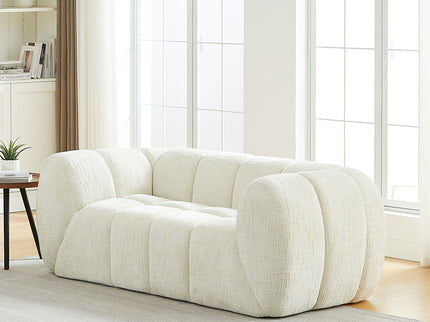 Quilted Cloud Sofa With Rounded Armrests And Piano Key Backrest Design