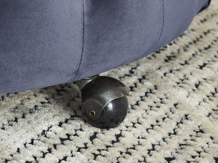 Modern Upholstered Swivel Chair With Button Tufted Design And Movable Wheels