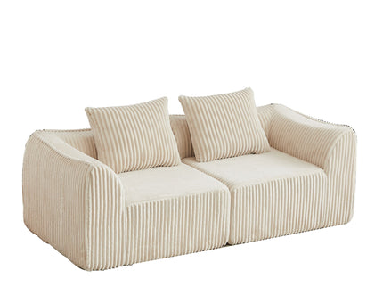 Minimalist Sofa With Curved Lines And Horn Shaped Throw Pillows