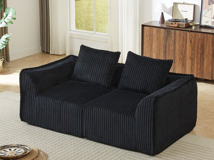 Minimalist Sofa With Curved Lines And Horn Shaped Throw Pillows