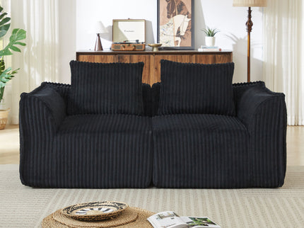 Minimalist Sofa With Curved Lines And Horn Shaped Throw Pillows