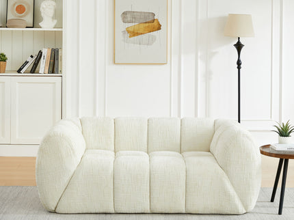 Quilted Cloud Sofa With Rounded Armrests And Piano Key Backrest Design