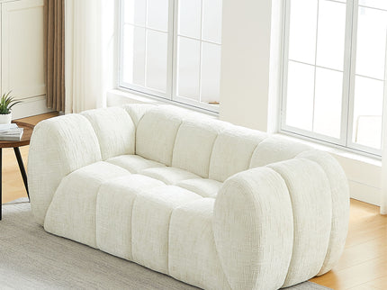 Quilted Cloud Sofa With Rounded Armrests And Piano Key Backrest Design