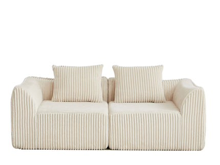 Minimalist Sofa With Curved Lines And Horn Shaped Throw Pillows