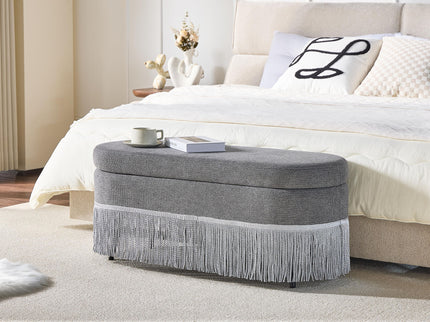Oval Upholstered Storage Ottoman With Fringe Trim & Lift Top Lid