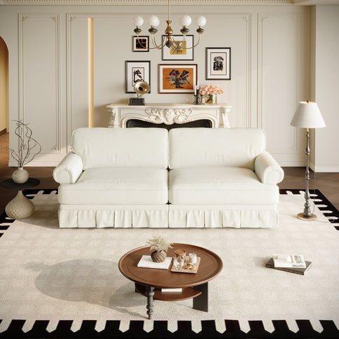 Luxuriously Comfortable Cloud Couch With Elegant Rolled Arms & Pleated Skirt Design
