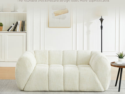 Quilted Cloud Sofa With Rounded Armrests And Piano Key Backrest Design