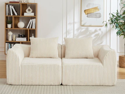 Minimalist Sofa With Curved Lines And Horn Shaped Throw Pillows