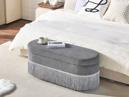 Oval Upholstered Storage Ottoman With Fringe Trim & Lift Top Lid
