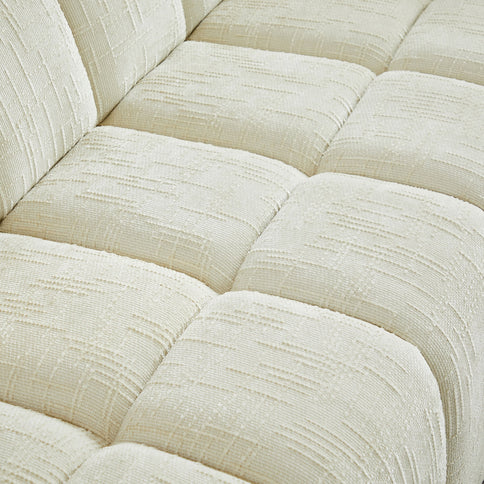 Quilted Cloud Sofa With Rounded Armrests And Piano Key Backrest Design